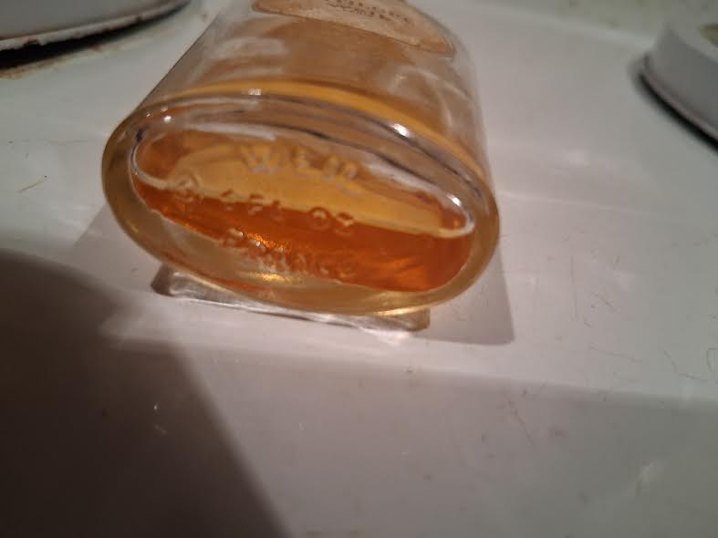 Glass perfume bottle titled "Antilope" by Weil