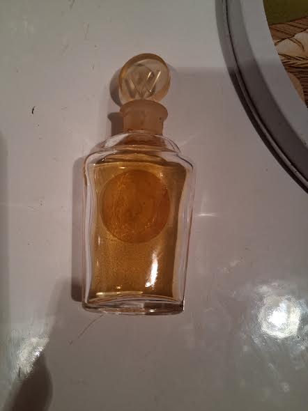 Glass perfume bottle titled "Antilope" by Weil