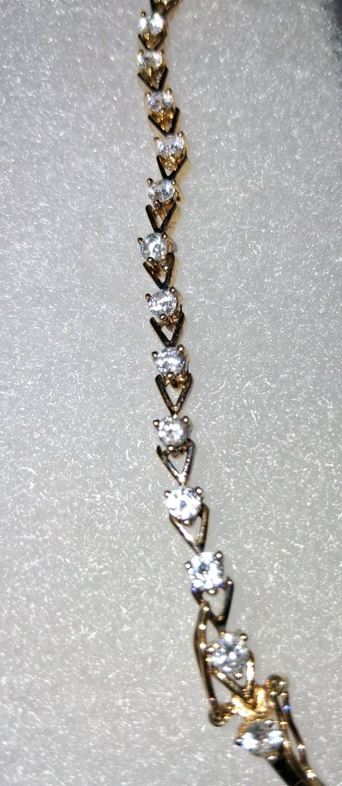 Gold tone 7" bracelet With Diamonds  