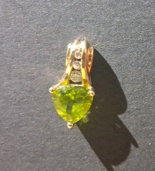 Pendant with oval Peridot and Diamond accents