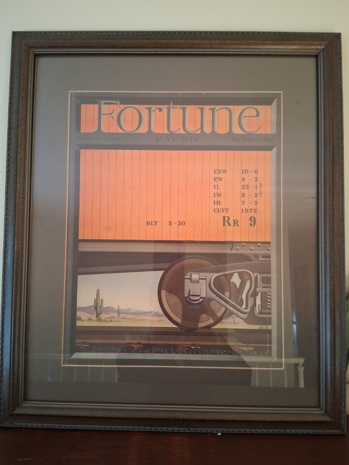 Framed Fortune Magazine cover from May 1939 featuring desert train illustration