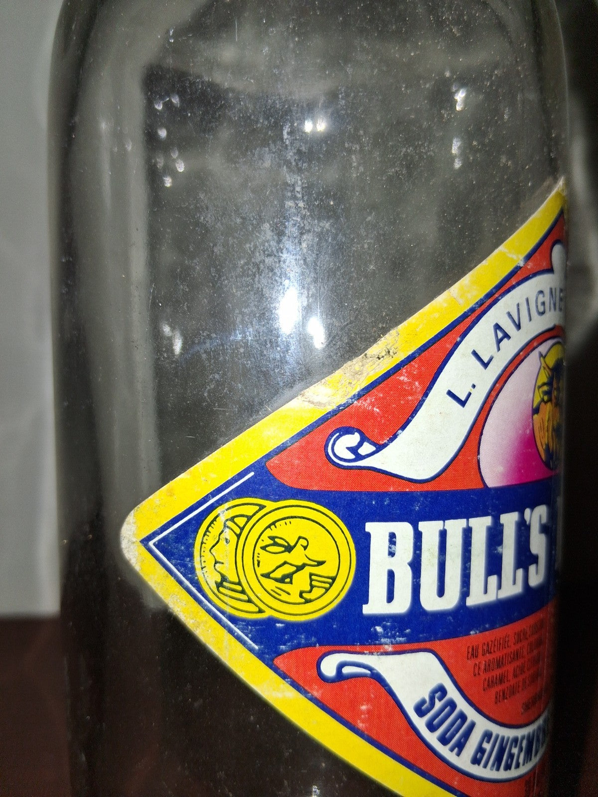  Glass soda bottle with 'Bull's Head Ginger Ale' label by Lavigne Limited