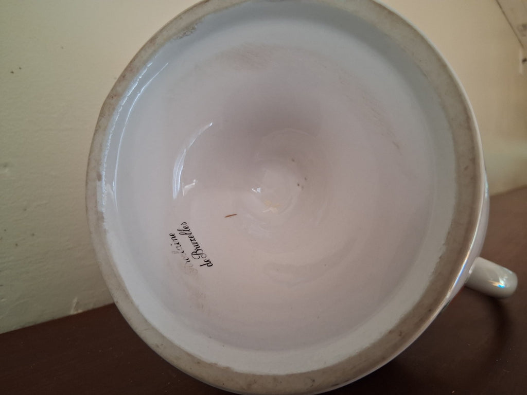 Porcelain vase with hand-painted floral decoration and gilt accents