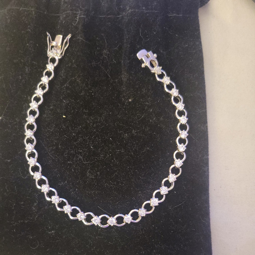 Tennis bracelet with oval-cut gems and diamond accents 8" 12.89g