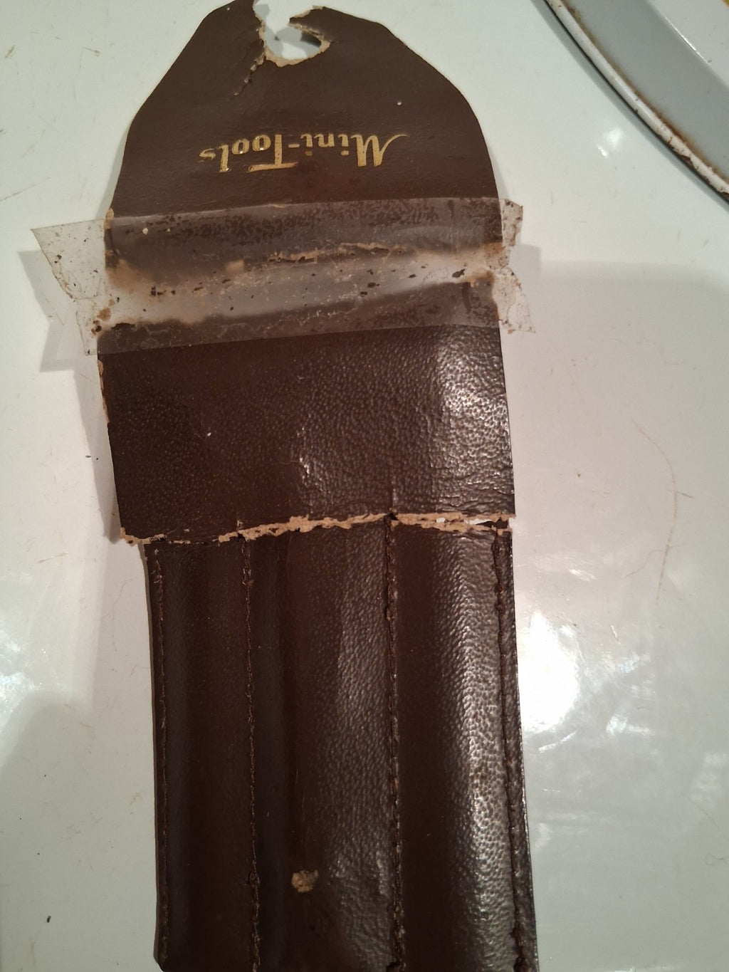 Leather tool pouch labeled 'Mini-Tools' made in Australia