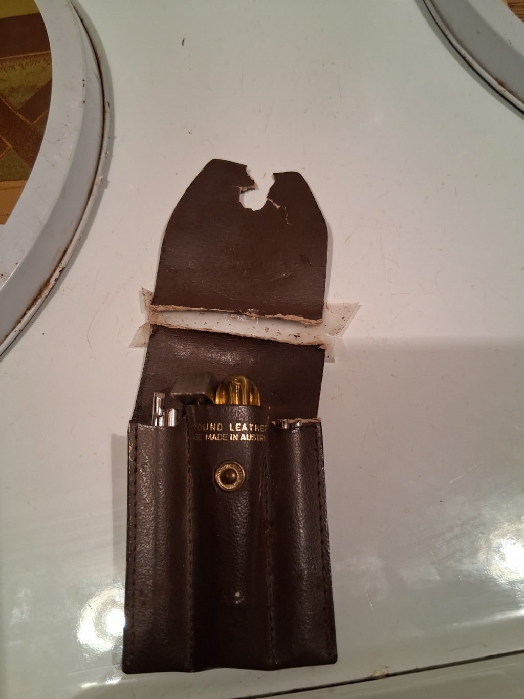 Leather tool pouch labeled 'Mini-Tools' made in Australia