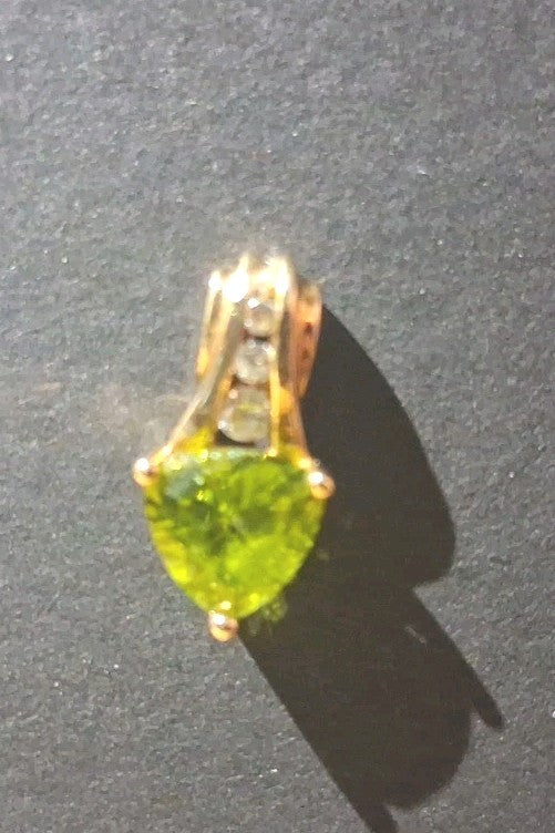 Pendant with oval Peridot and Diamond accents