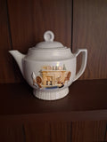 Vitreous china teapot with Colonial Hearth scene by Porcelier