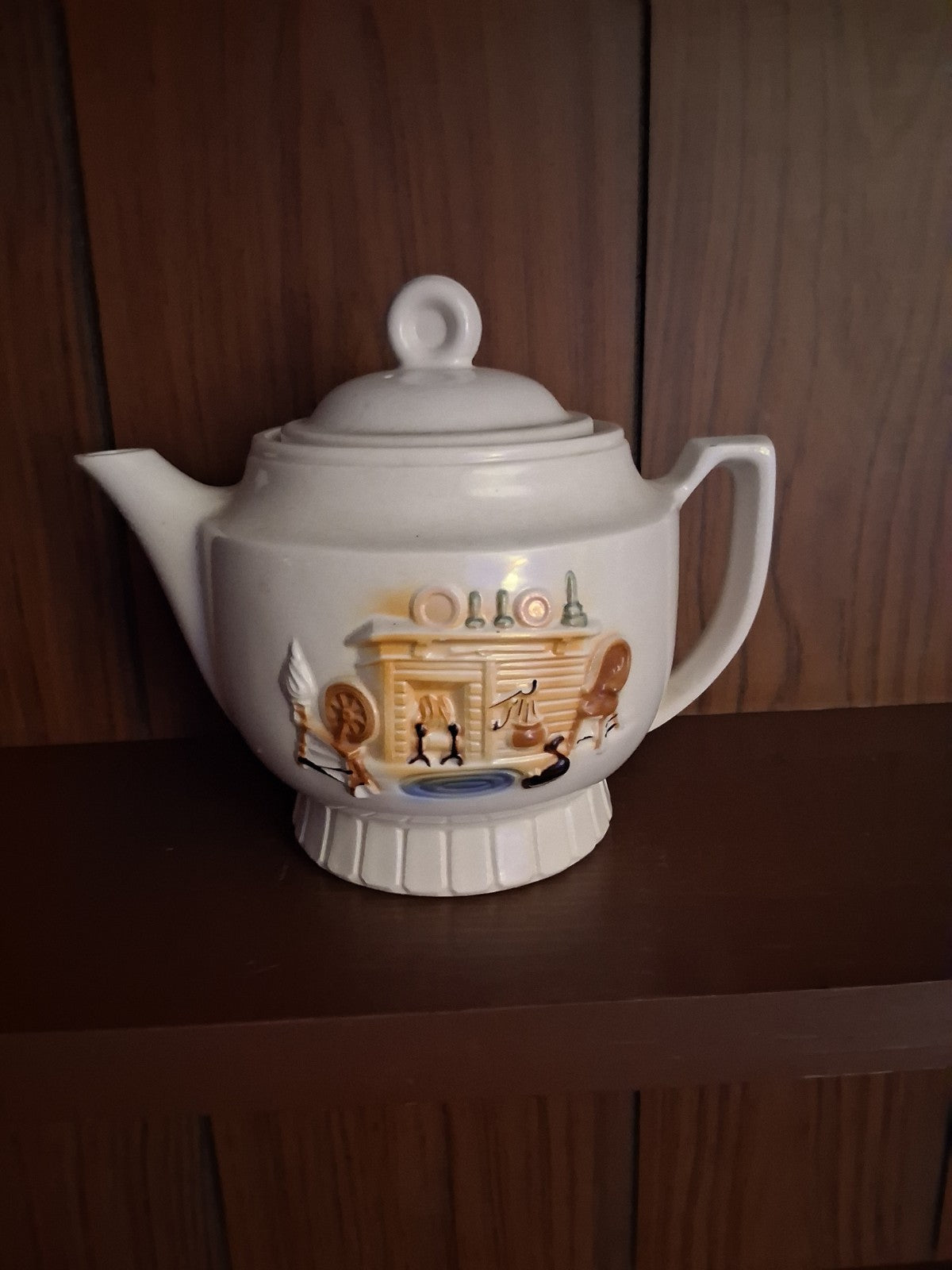Vitreous china teapot with Colonial Hearth scene by Porcelier