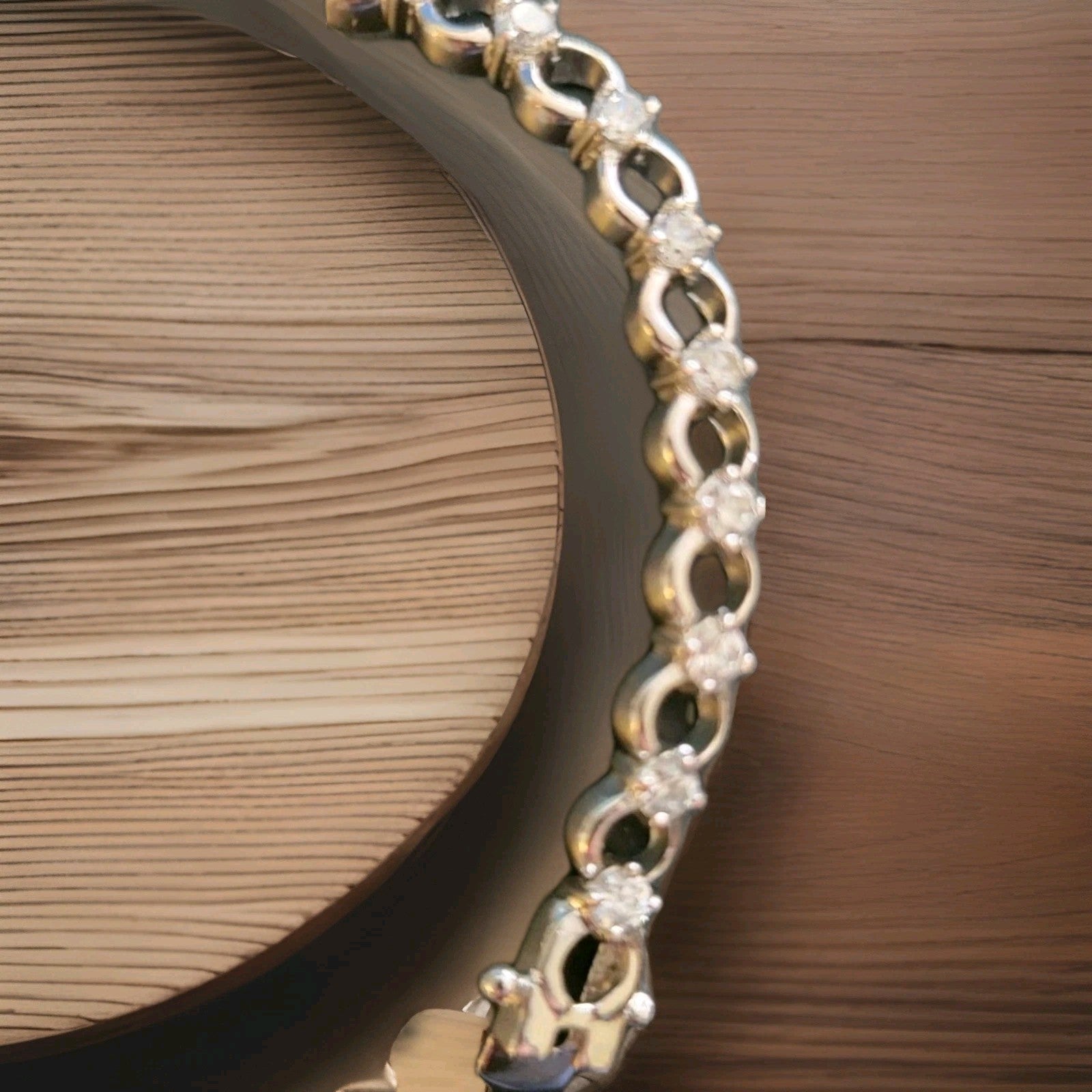 Tennis bracelet with oval-cut gems and diamond accents 8" 12.89g