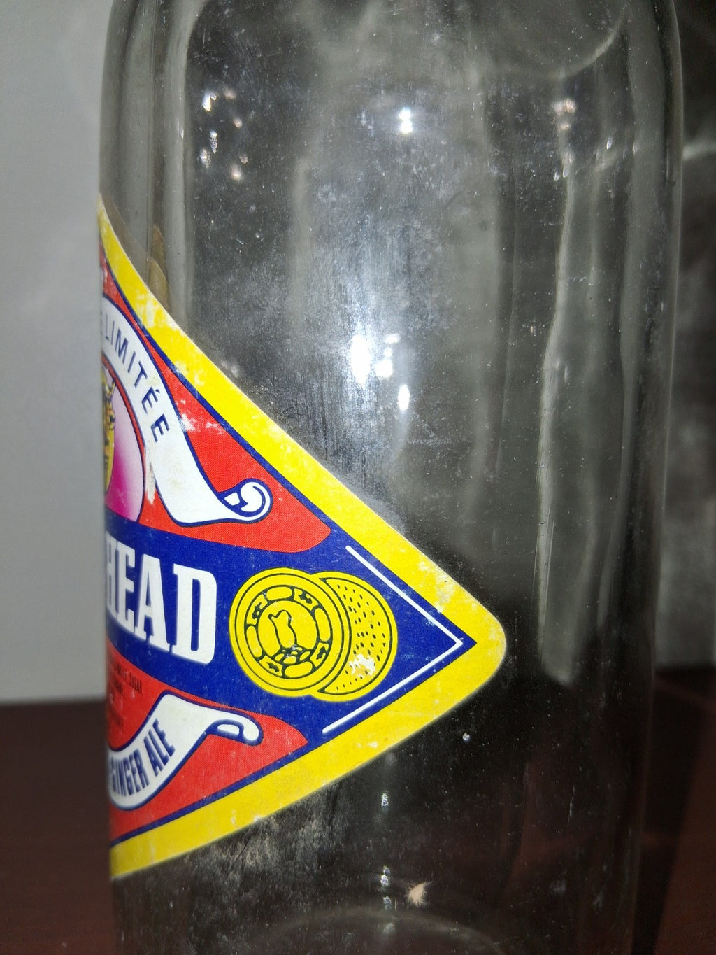  Glass soda bottle with 'Bull's Head Ginger Ale' label by Lavigne Limited