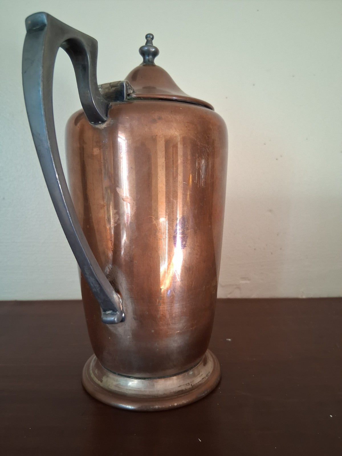 Copper coffee pot with ebonized wood handle and finial