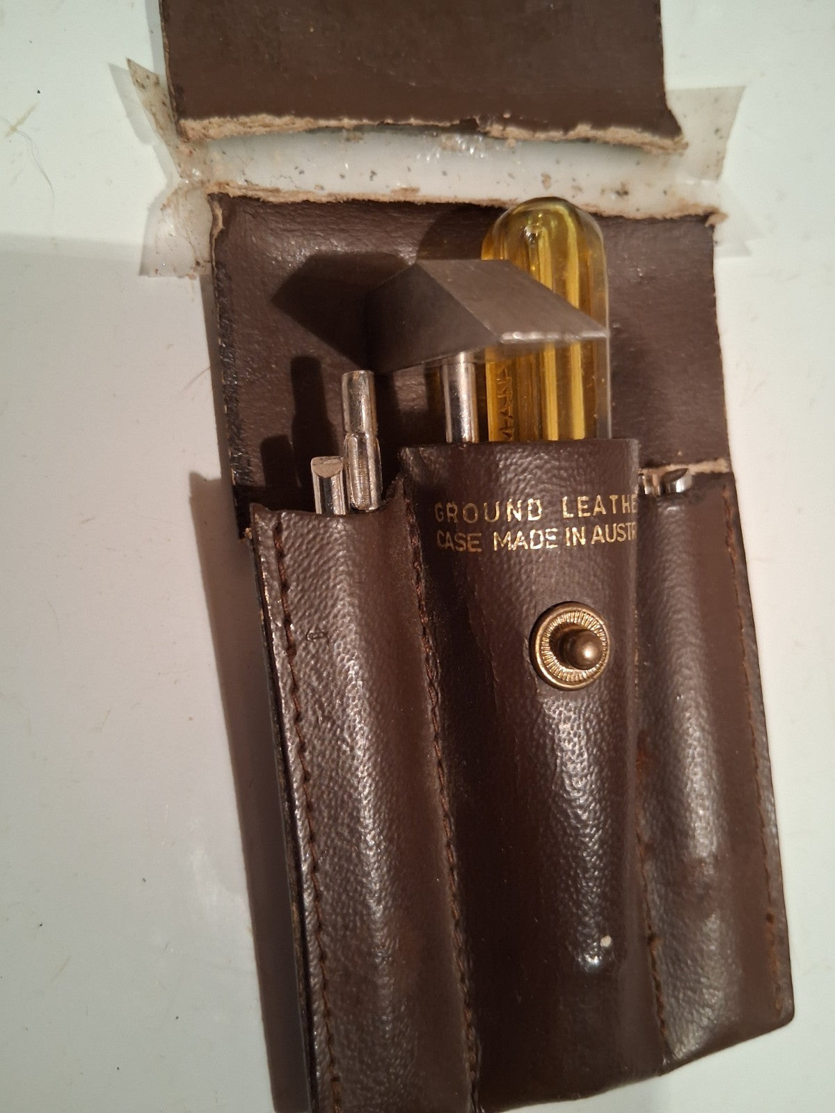 Leather tool pouch labeled 'Mini-Tools' made in Australia