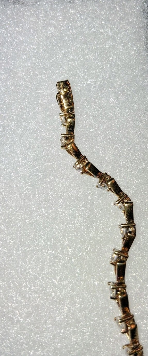 Gold tone 7" bracelet With Diamonds  