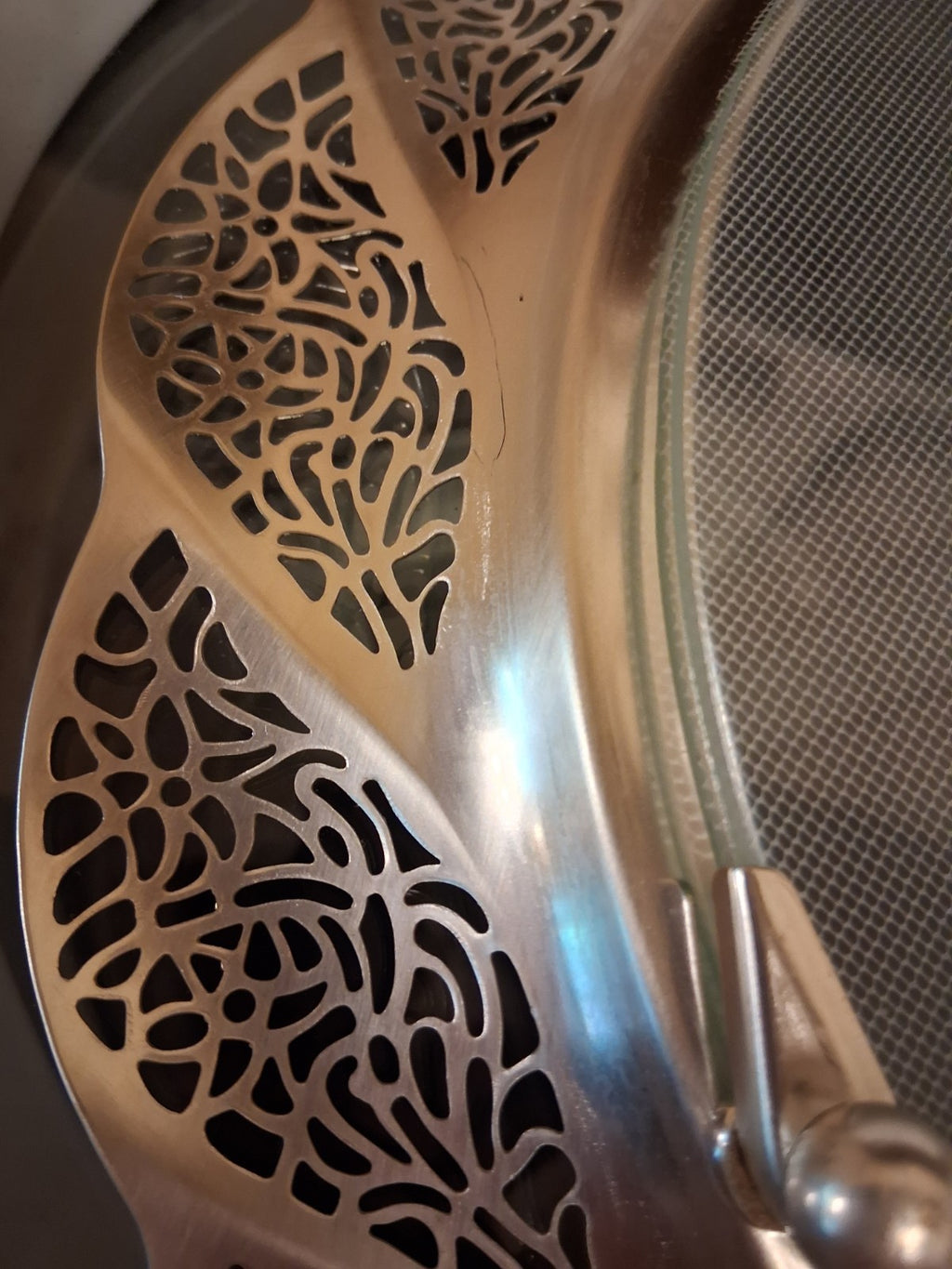 Silver-plated oval serving tray with ornate grapevine border and enamel center