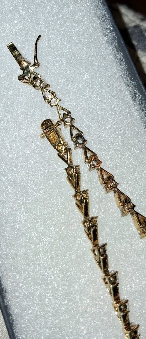 Gold tone 7" bracelet With Diamonds  