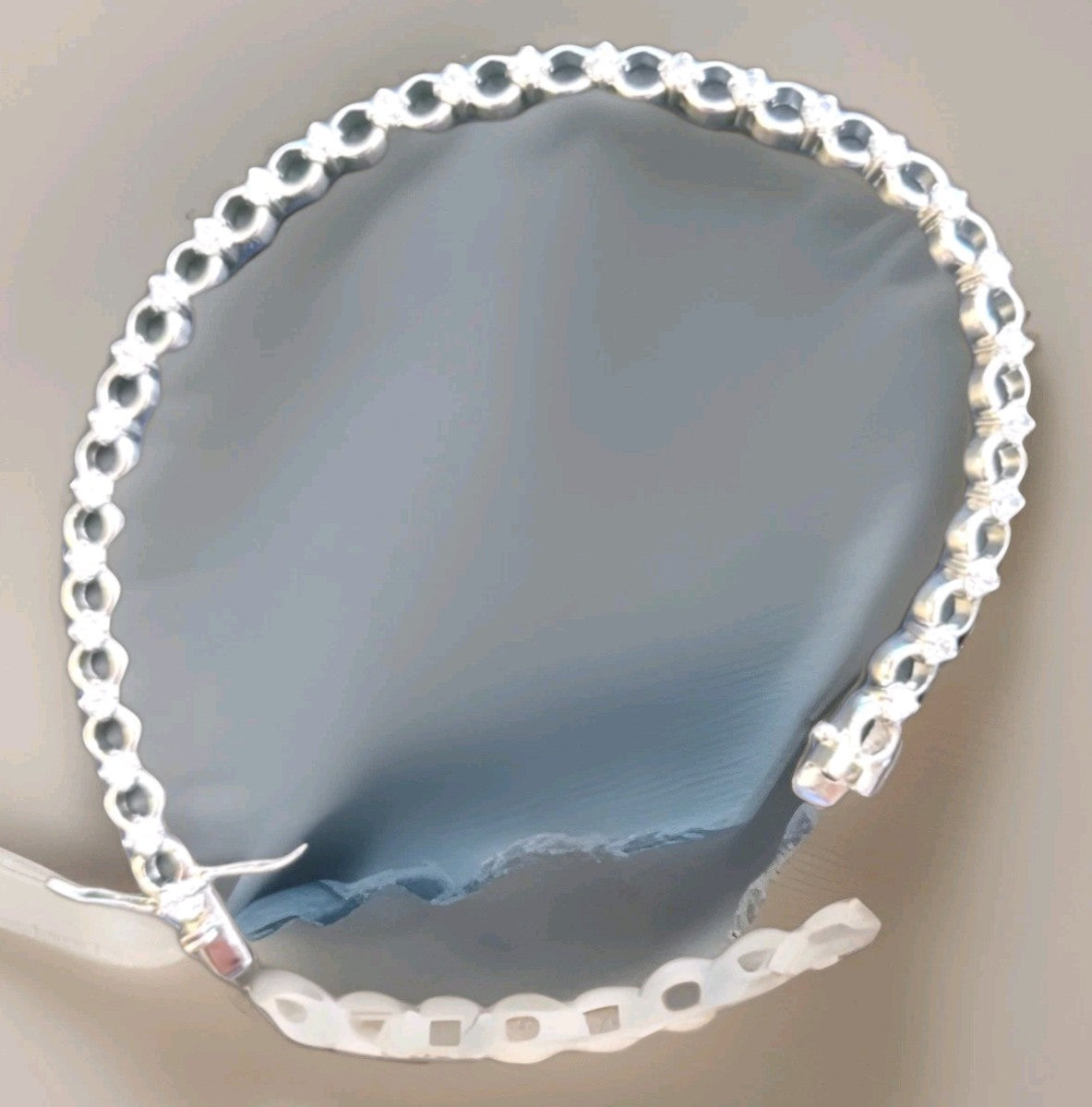 Tennis bracelet with oval-cut gems and diamond accents 8" 12.89g