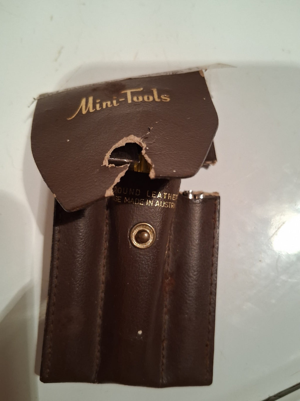Leather tool pouch labeled 'Mini-Tools' made in Australia