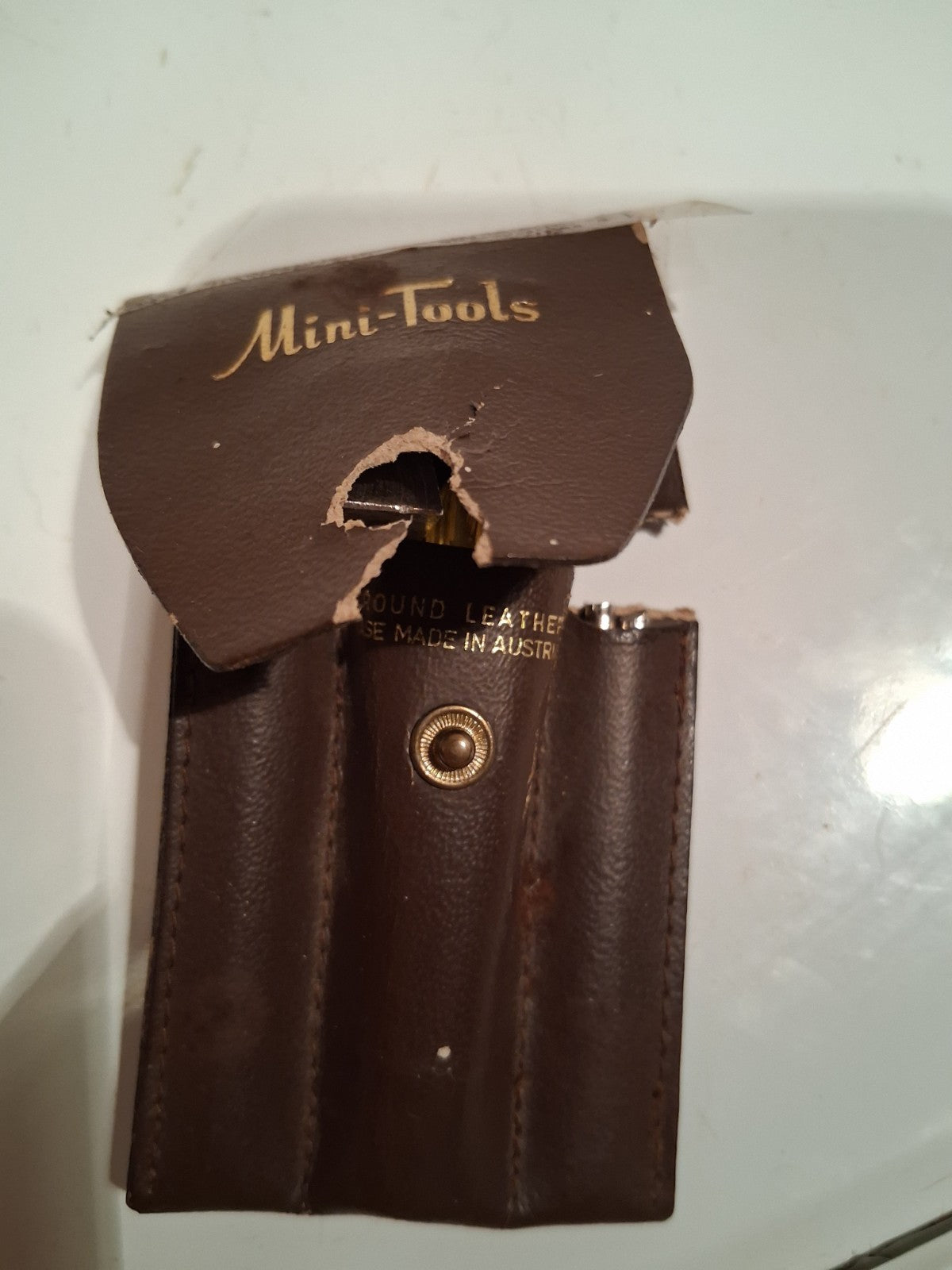 Leather tool pouch labeled 'Mini-Tools' made in Australia