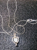 Sterling Silver 925 Necklace with a Caged  Pearl.
