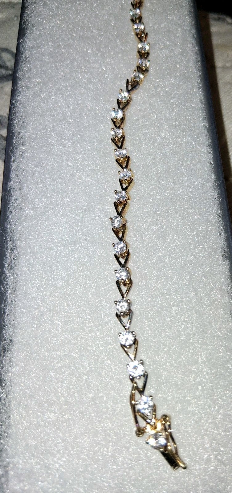 Gold tone 7" bracelet With Diamonds  