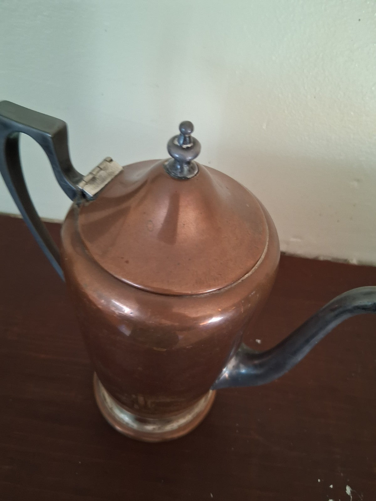 Copper coffee pot with ebonized wood handle and finial