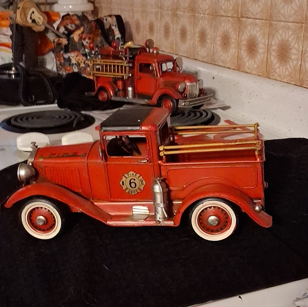 Vintagr Metal model of a 1931 Ford Fire Chief  Truck