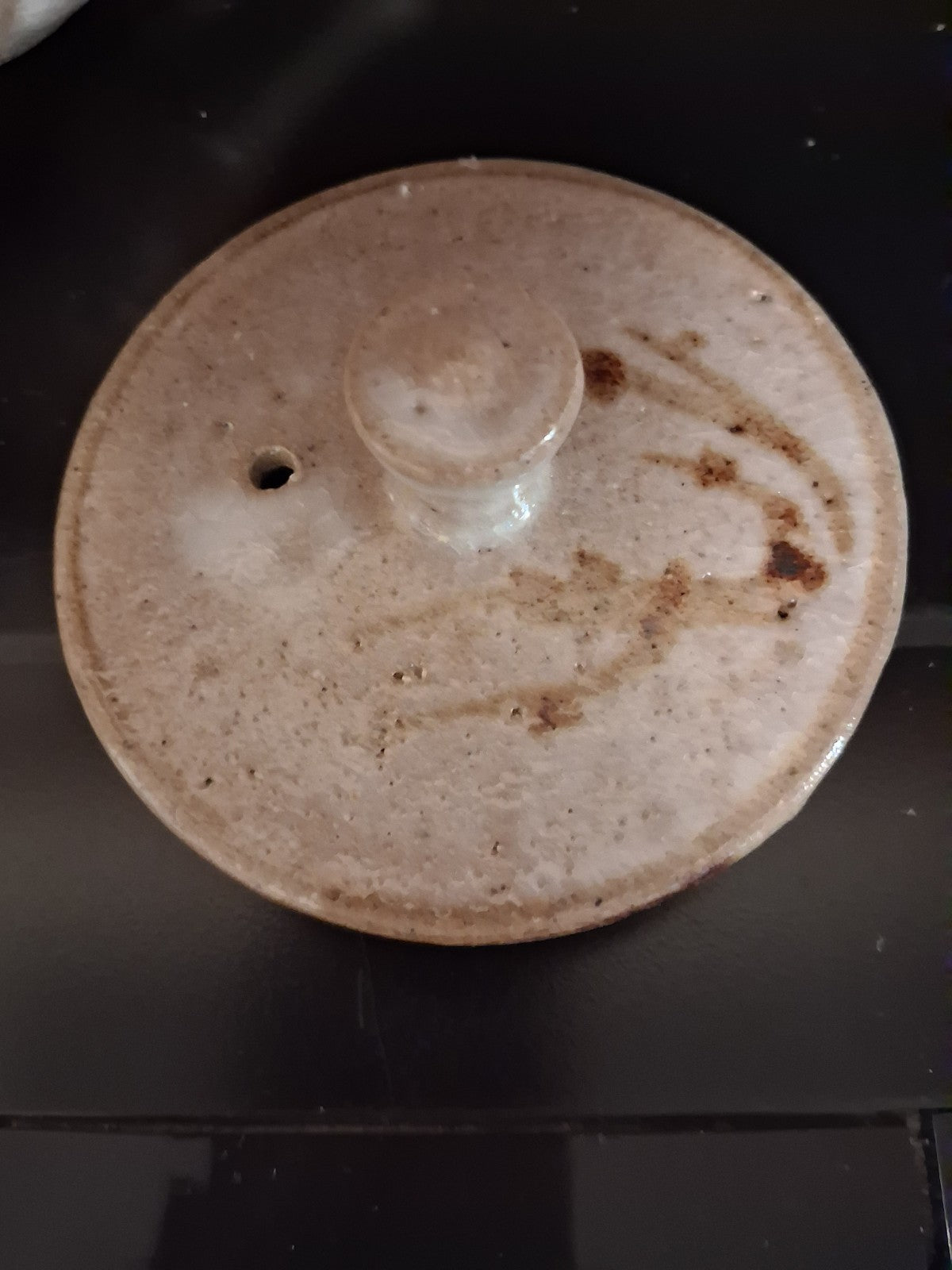 Stoneware studio pottery pitcher with abstract botanical decoration