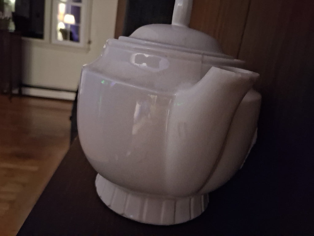 Vitreous china teapot with Colonial Hearth scene by Porcelier