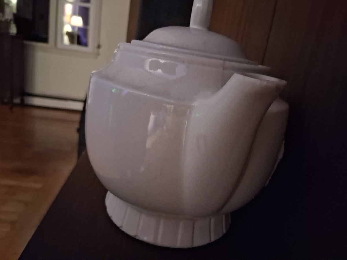 Vitreous china teapot with Colonial Hearth scene by Porcelier