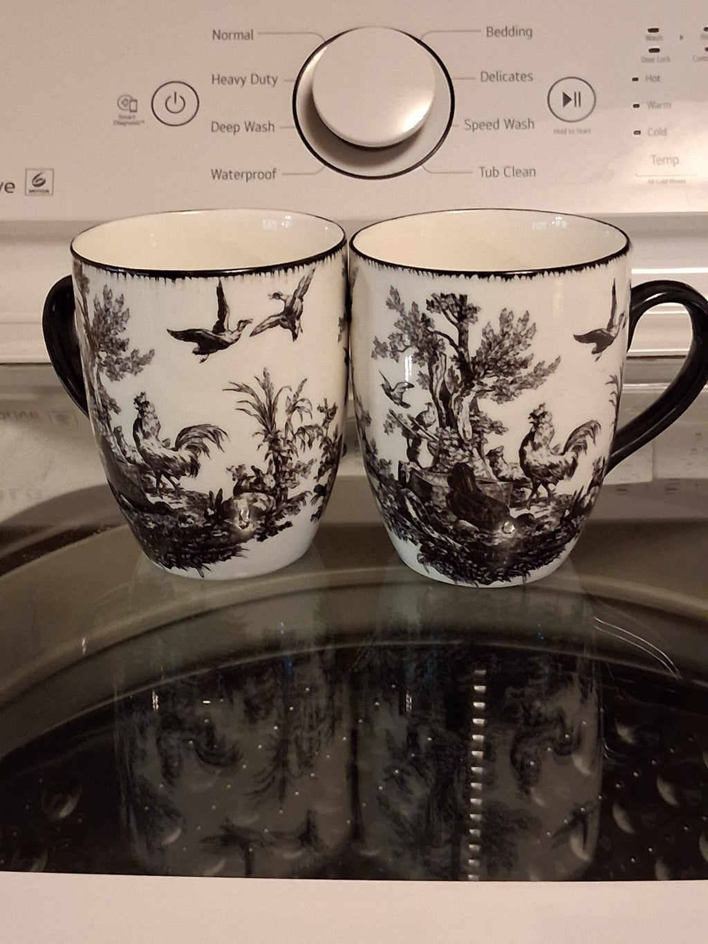 Ceramic mugs with black and white Toile de Jouy pattern by Aux Au Provence