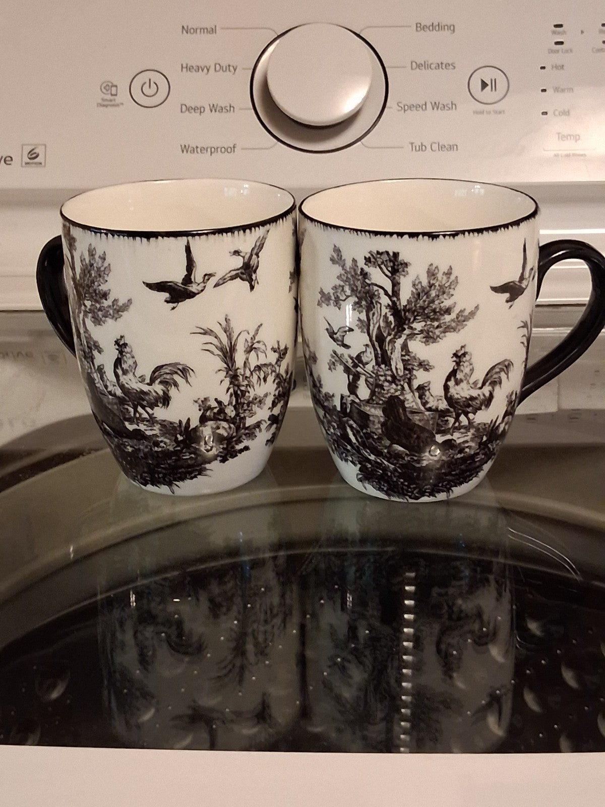 Ceramic mugs with black and white Toile de Jouy pattern by Aux Au Provence