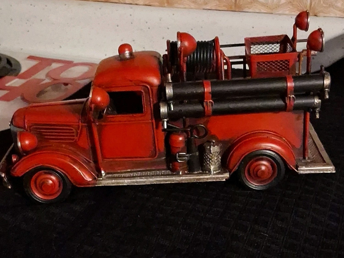 Vintage metal fire truck with handmade antique decot