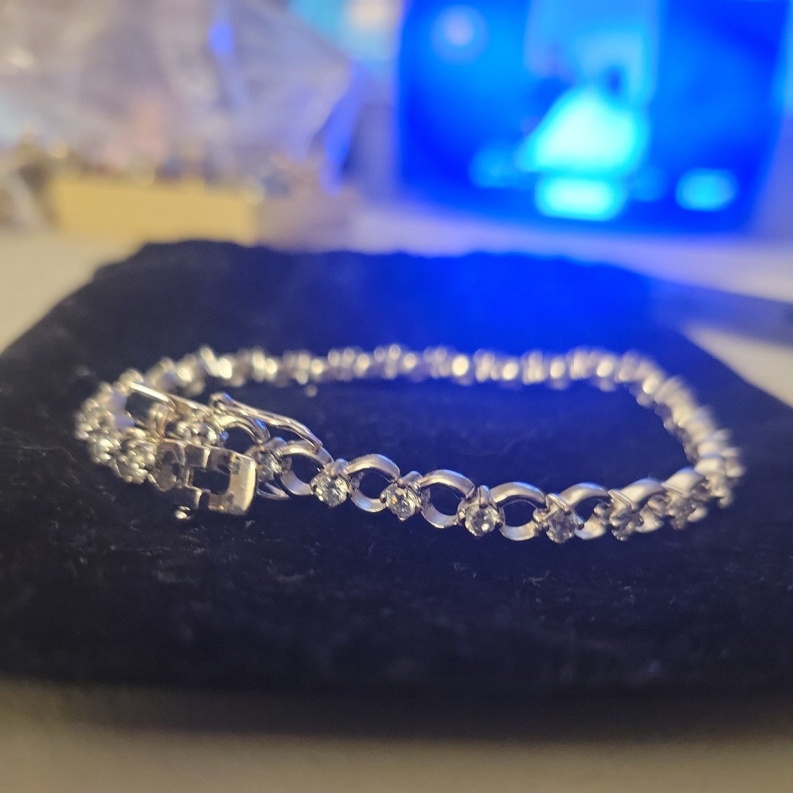 Tennis bracelet with oval-cut gems and diamond accents 8" 12.89g
