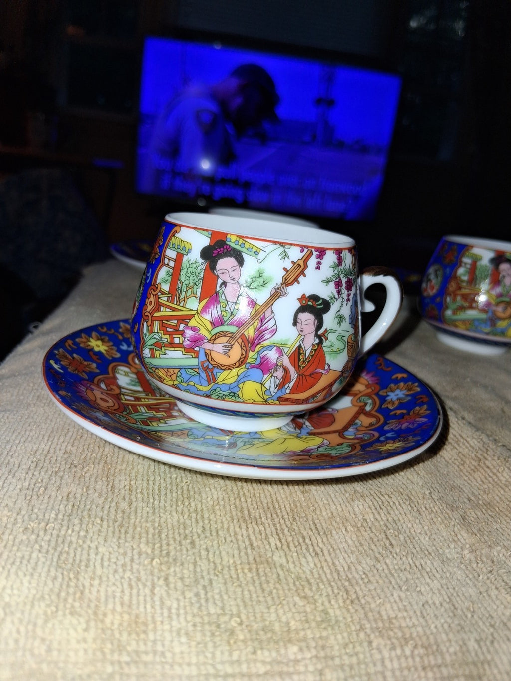 Set Of 4 Hand-painted  depicting Chinese court Saucer & Geisha In  bottom Of Cup