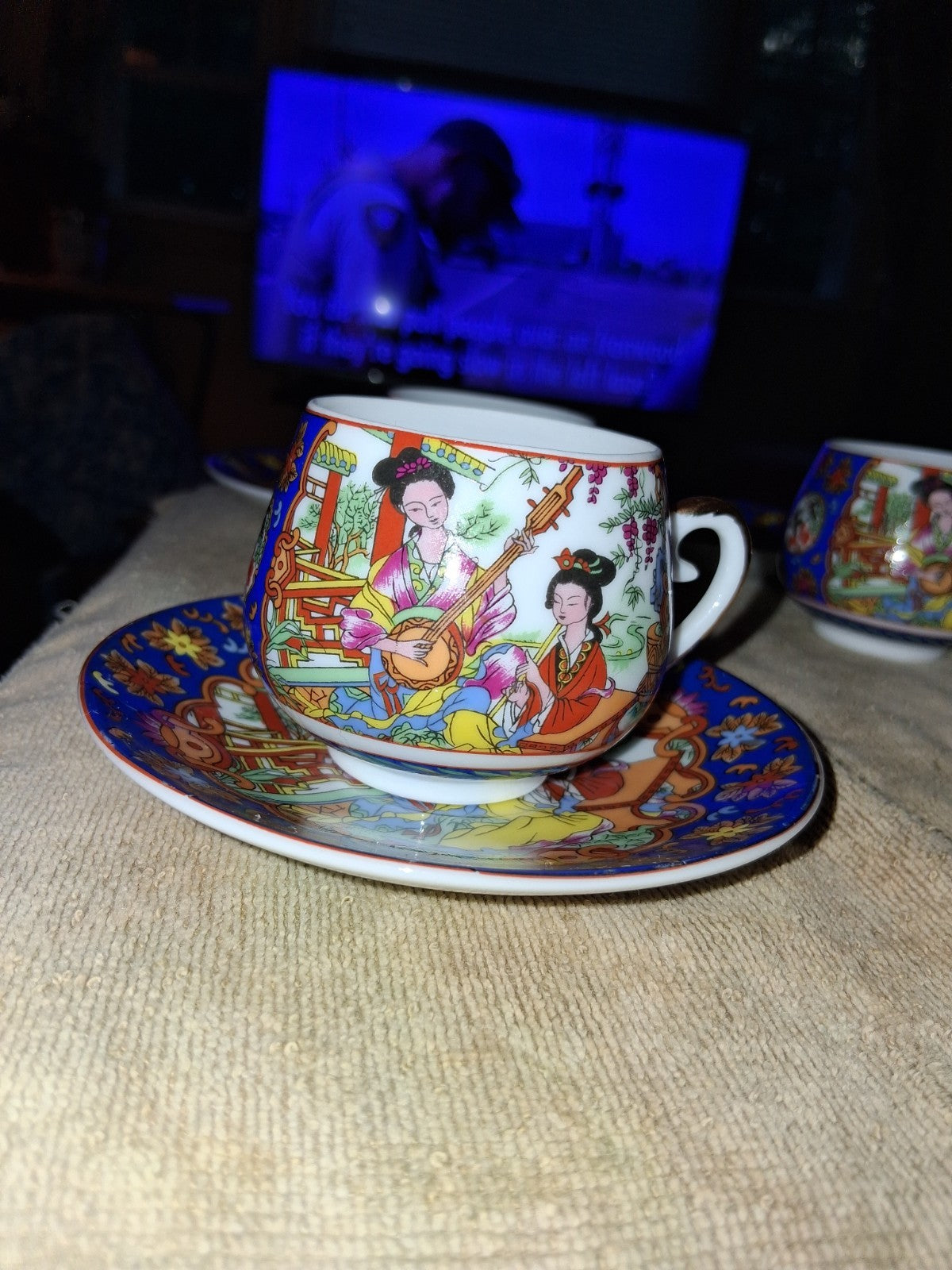 Set Of 4 Hand-painted  depicting Chinese court Saucer & Geisha In  bottom Of Cup