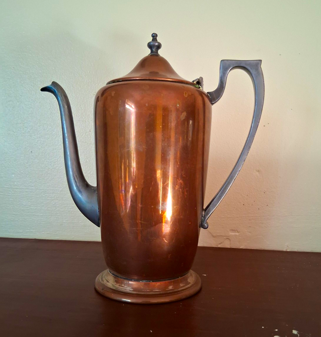 Copper coffee pot with ebonized wood handle and finial