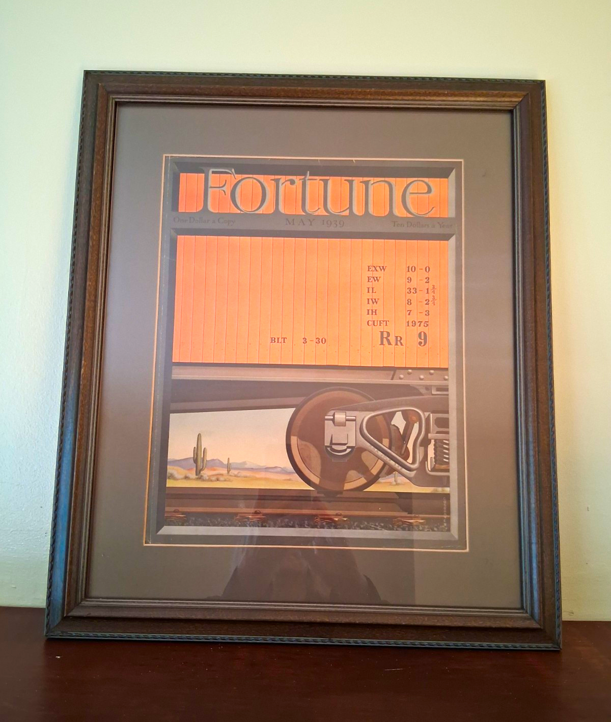 Framed Fortune Magazine cover from May 1939 featuring desert train illustration