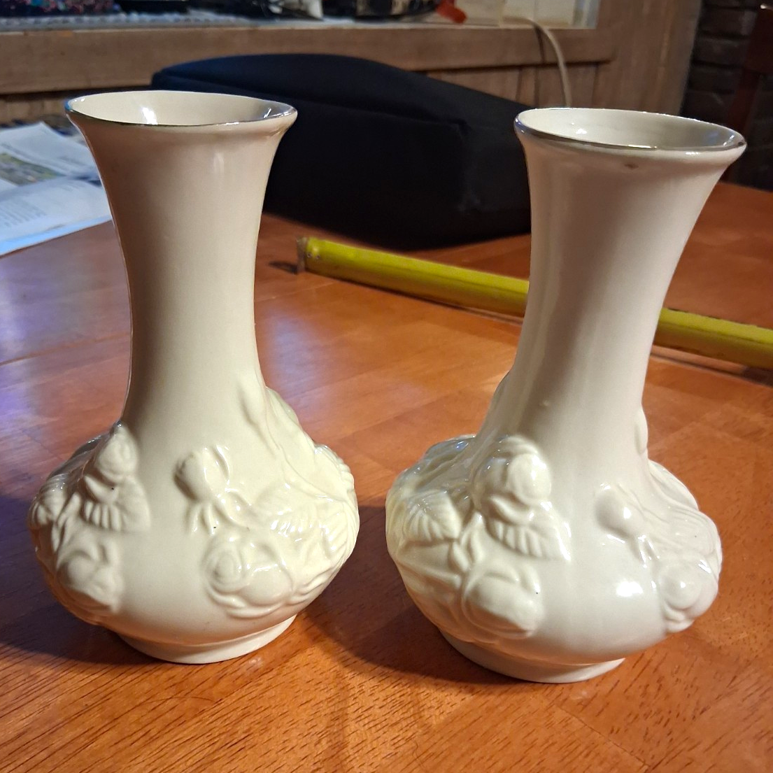 Pair of Belleek porcelain vases with grapevine pattern