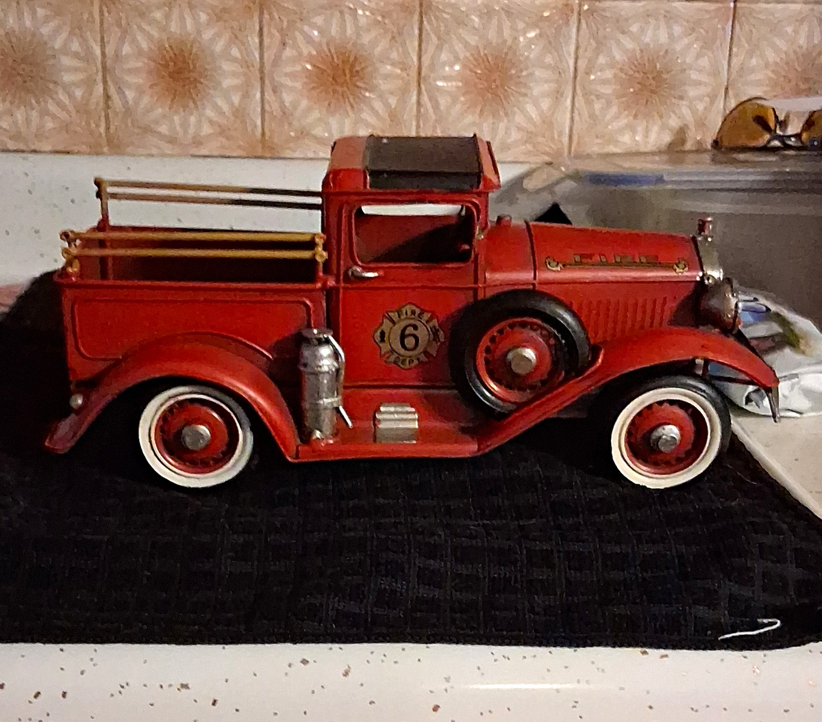 Vintagr Metal model of a 1931 Ford Fire Chief  Truck